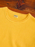 Stand Wheeler Pigment-Dyed T-Shirt in Gold