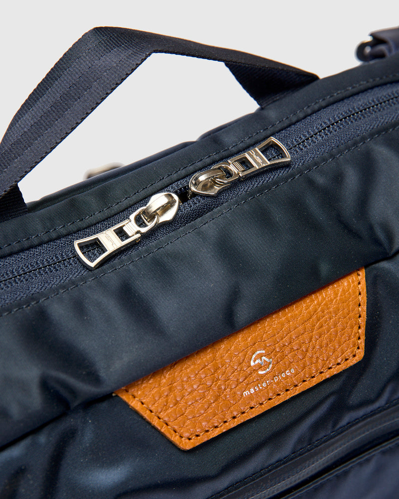 Progress Shoulder Carry Bag in Navy
