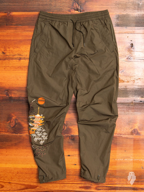 Crane Woven Trackpants in Maha Olive